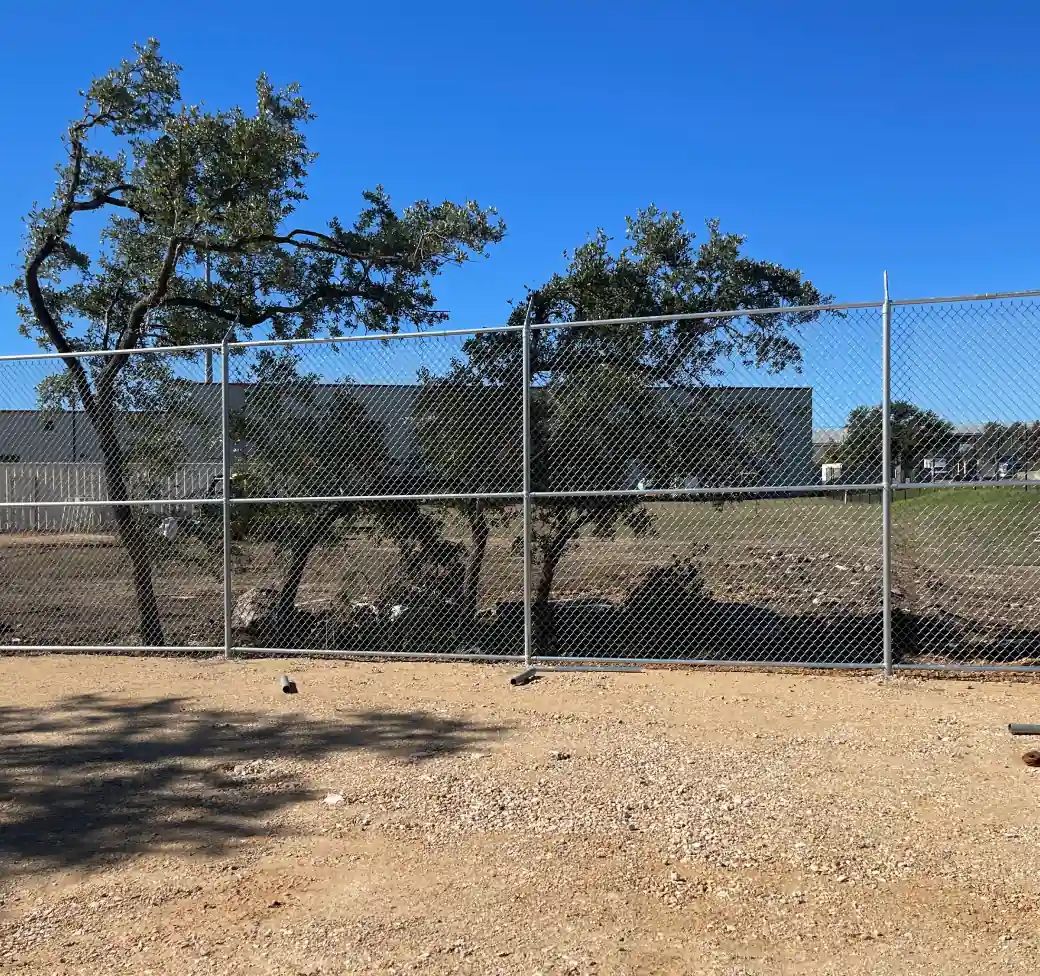 Galvanized chain link fence around a construction site