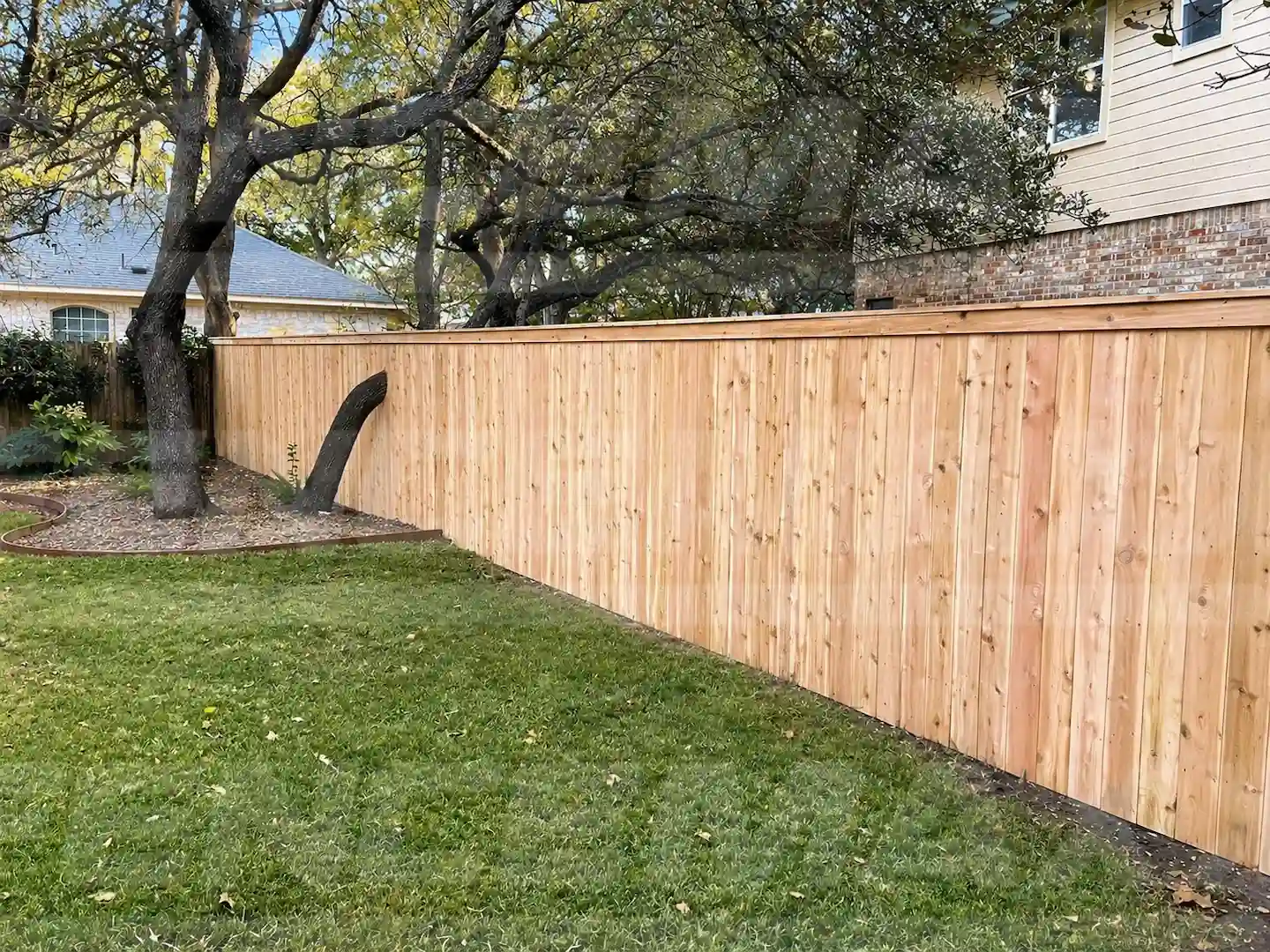 Cedar privacy fence with cap and trim